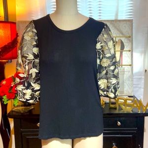 Black and gold blouse with sheer sleeves